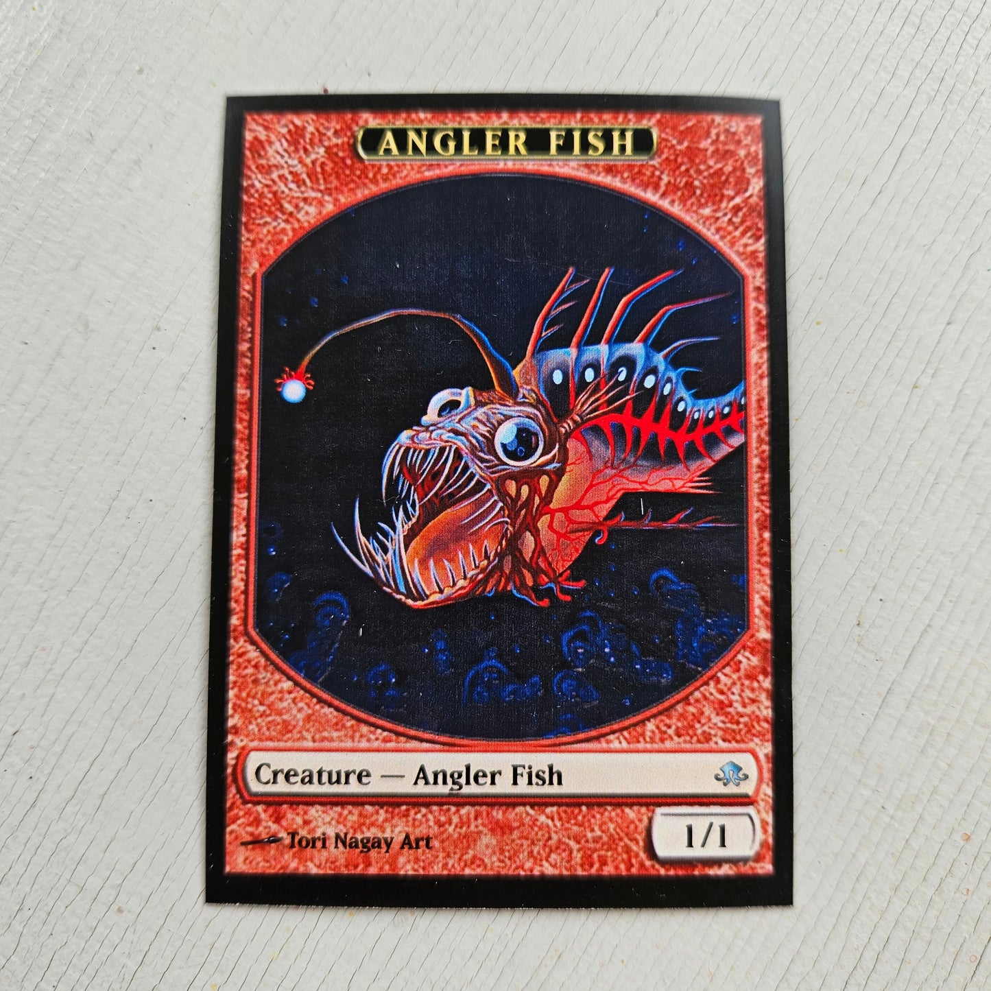 Custom Magic The Gathering tokens with fantasy artwork the Angler Fish by Tori Nagay